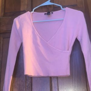 This is a  long sleeve F21 baby pink top